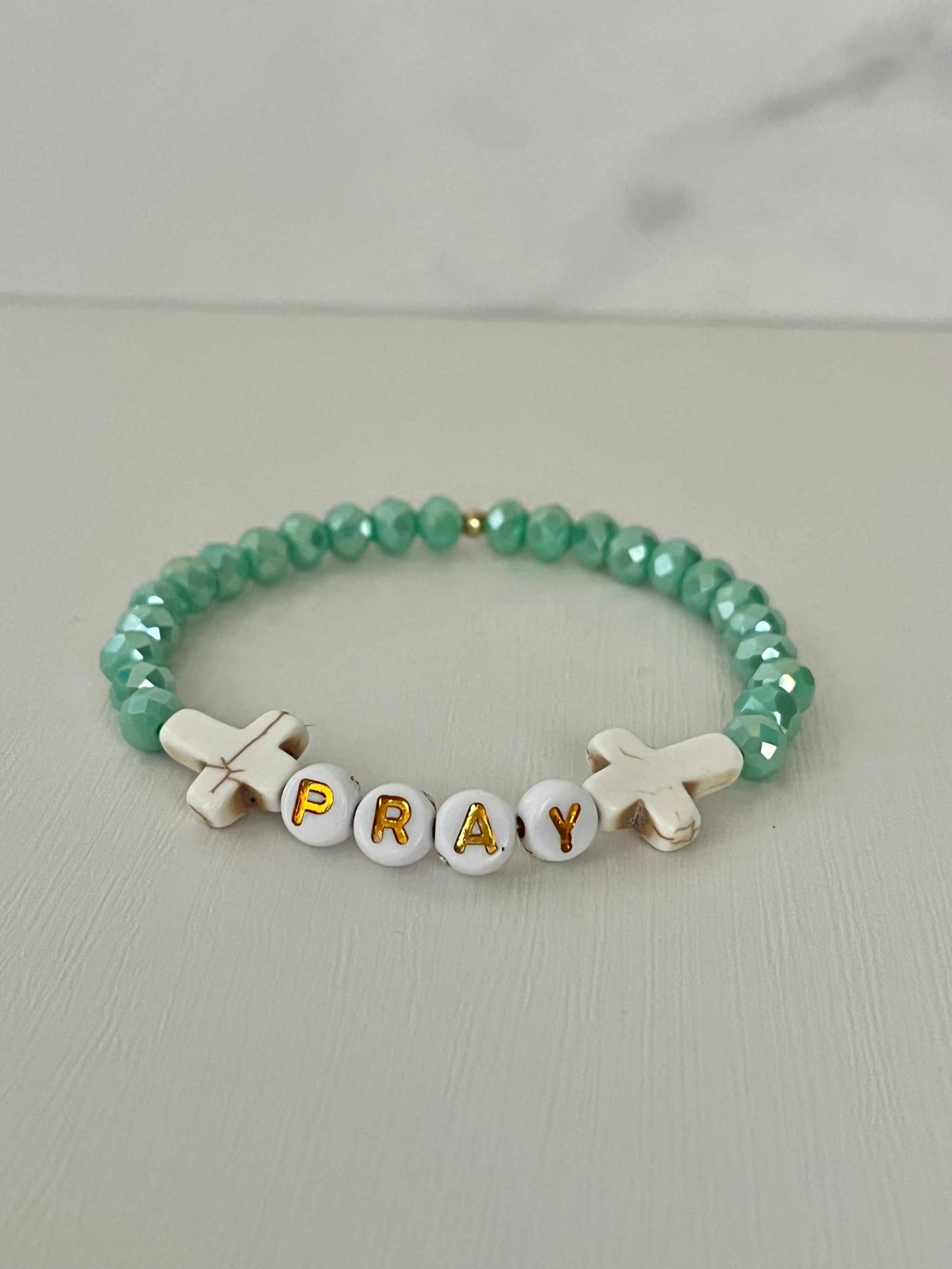 Close up of a PRAY Mint Faceted Beaded Bracelet featuring vibrant mint beads.