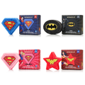 Four Spongellé DC Superhero body wash infused buffers in shapes of diamonds and stars with matching hero-themed packaging