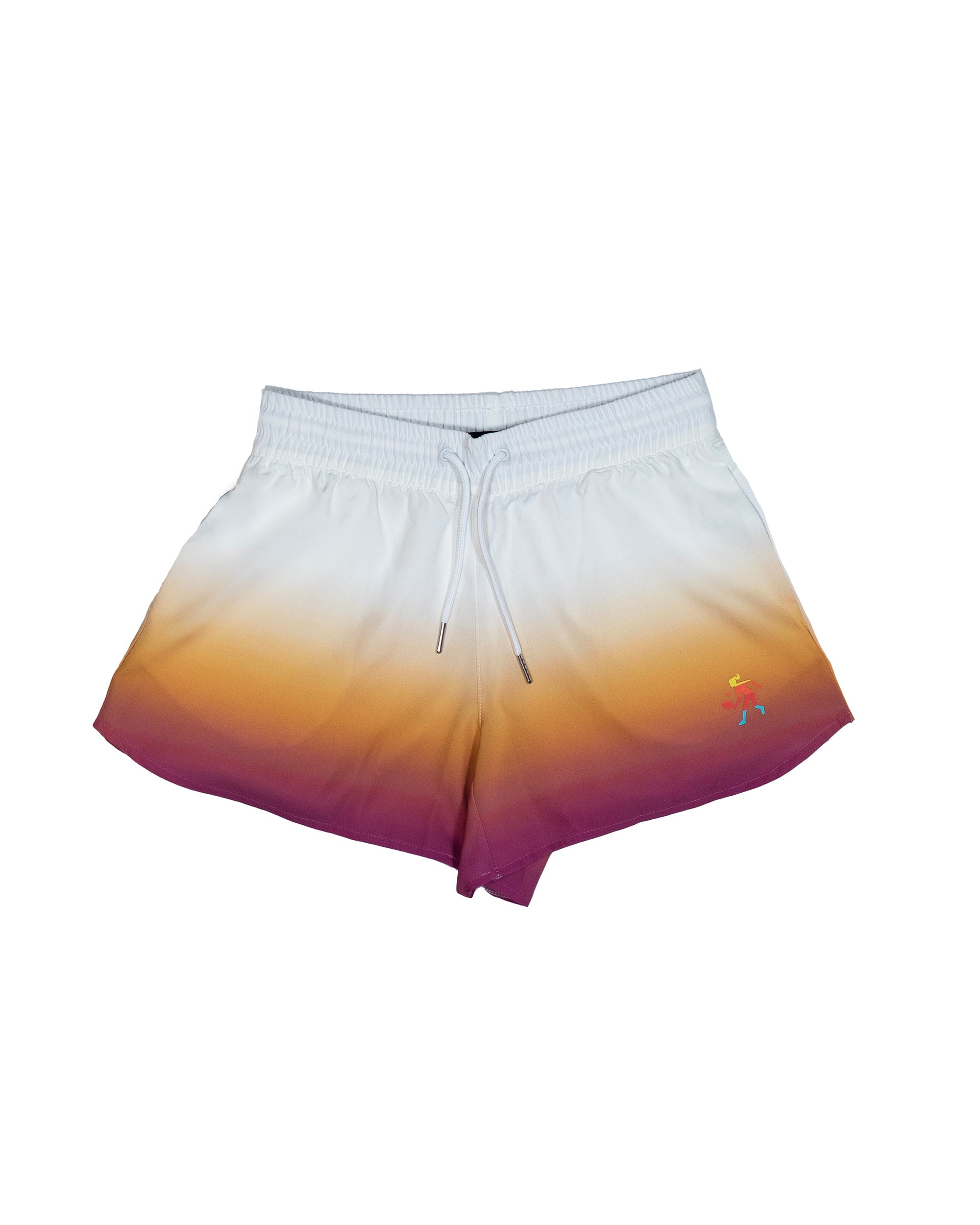 Woman wearing dip dye performance pickleball shorts with a white, orange, and purple color gradient on a tennis court.
