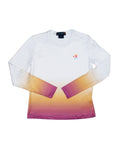 Woman playing pickleball wearing a white long sleeve crewneck with a yellow to pink dip dye hem