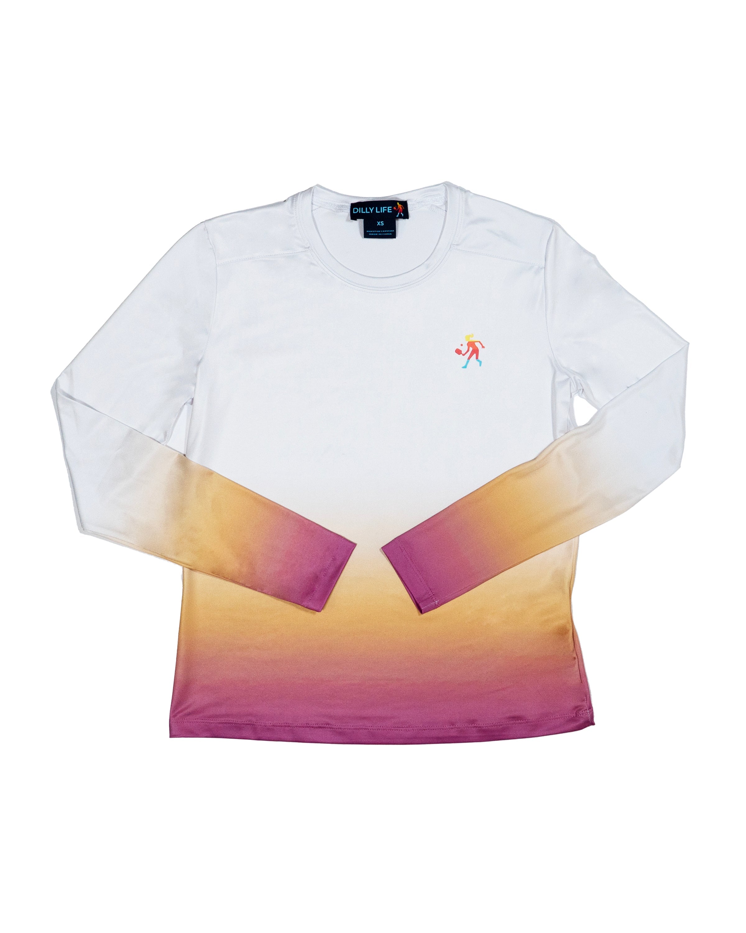 Woman playing pickleball wearing a white long sleeve crewneck with a yellow to pink dip dye hem