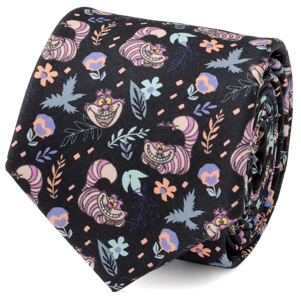 Close up of a black necktie with a repeating Cheshire Cat and floral pattern from Disney's Alice in Wonderland