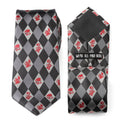 A gray argyle necktie featuring red stitched characters from Alice in Wonderland, including the Cheshire Cat and Mad Hatter.