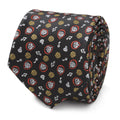 Close up of a black necktie featuring a repeating pattern of Disney Pixar Coco characters and music notes