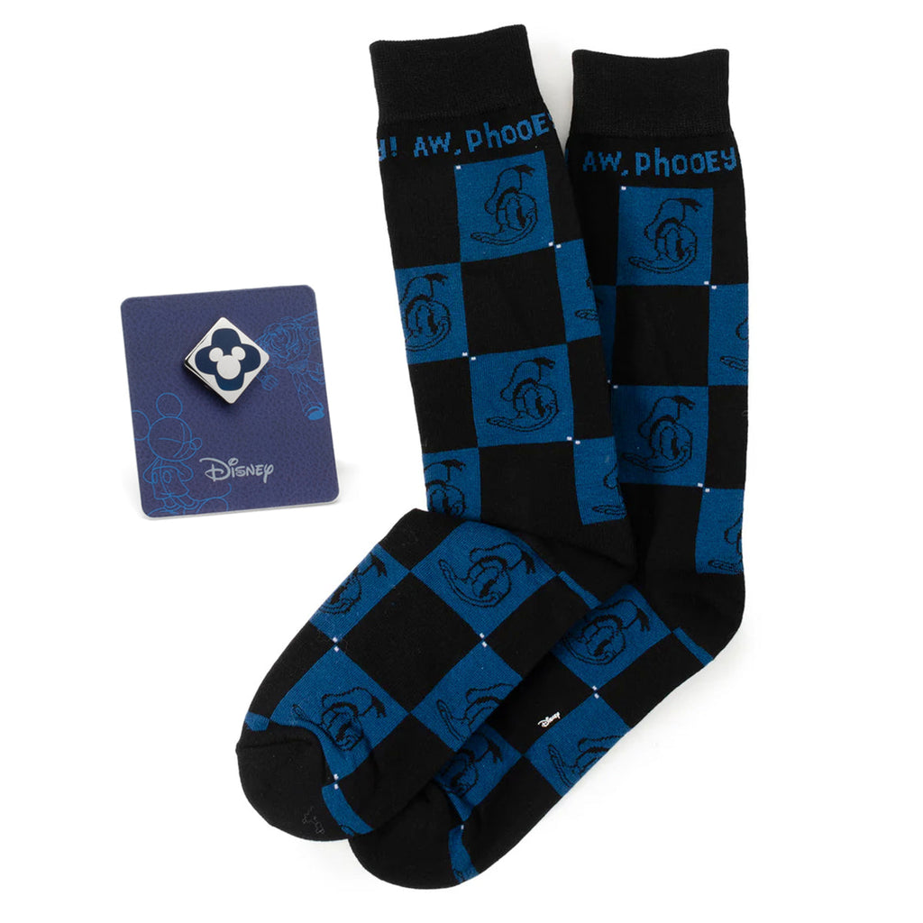 A pair of black and blue checkered Disney socks with Donald Duck graphics and a separate silver Mickey Mouse lapel pin on a backing card.