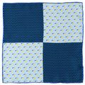 Folded Disney Donald Duck silk pocket square showing light blue Donald Duck pattern and navy blue star pattern
