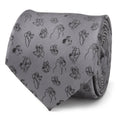 A rolled gray necktie featuring a repeat pattern of various Disney dog characters in black line art.