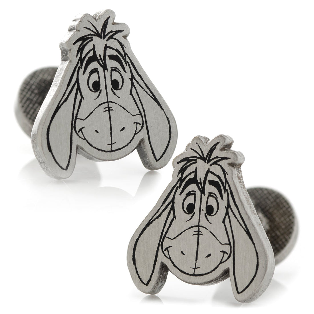 A pair of silver plated Disney Eeyore cufflinks showing the character face on the front and his tail on the round backing.