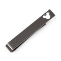 A black metal tie bar with a small Mickey Mouse icon cutout on the right end shown on a plain background and also clipped onto a red and black Mickey pattern necktie.