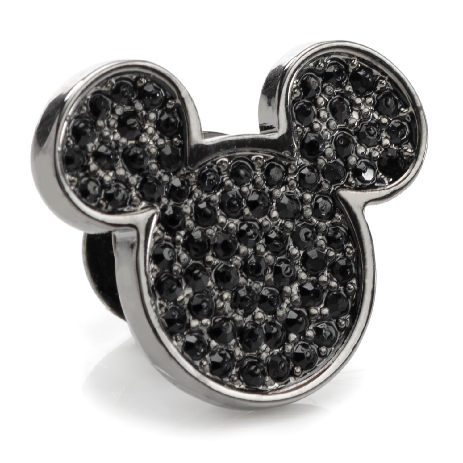 Close-up of a black stainless steel Mickey Mouse head silhouette lapel pin covered in black pave crystals.