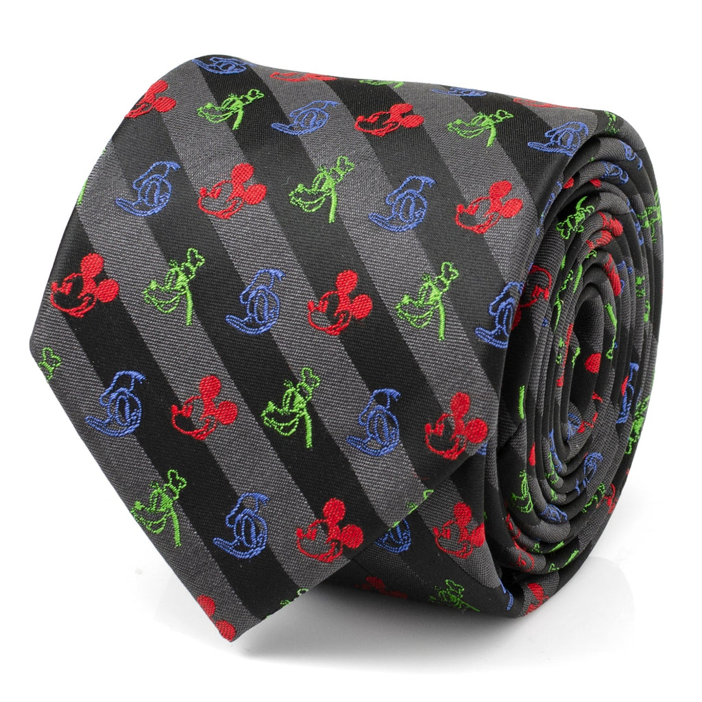 Close up and studio view of a black and grey striped men's necktie featuring small embroidered Disney character icons in red, blue, and green.