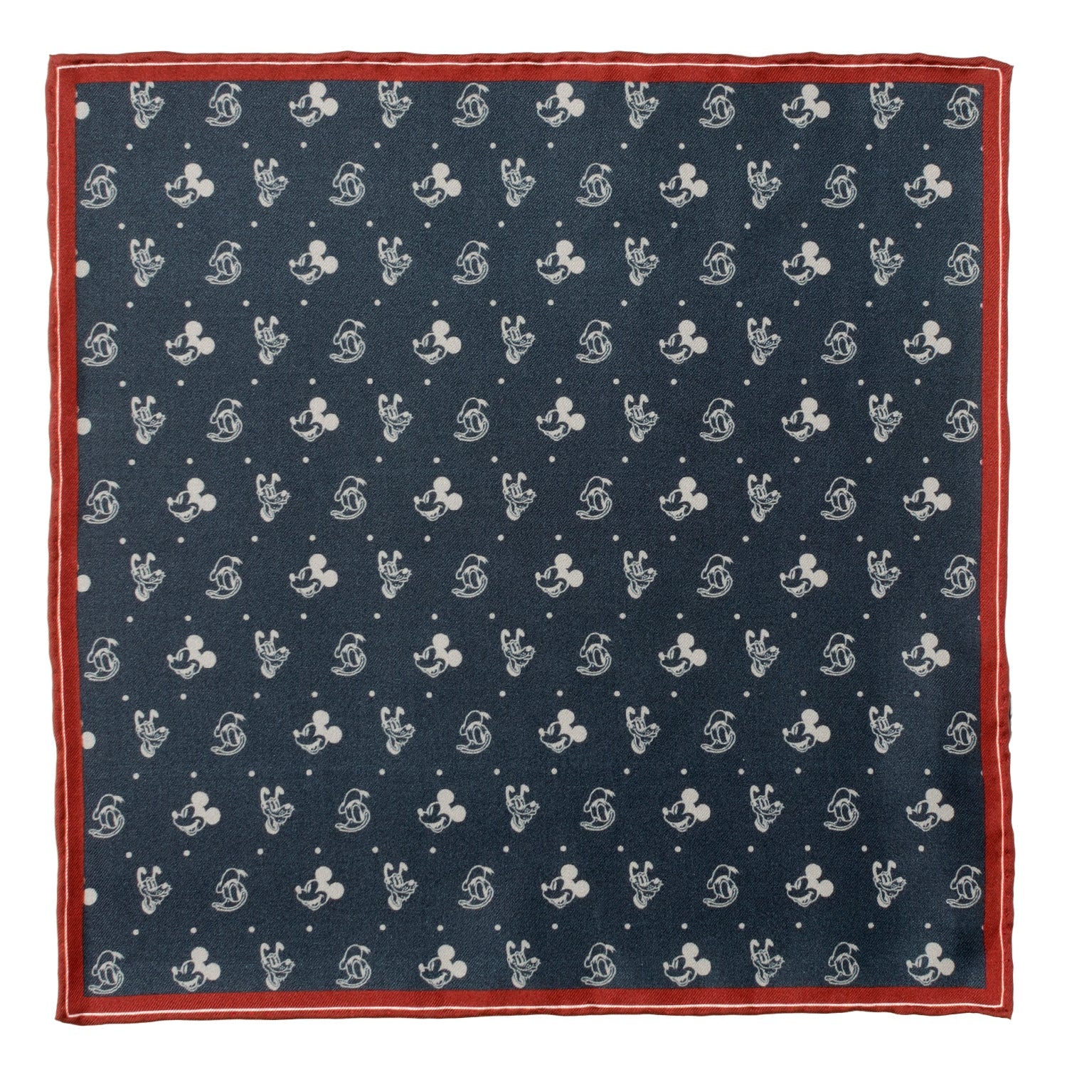 A navy silk pocket square with a white print of Mickey Mouse, Donald Duck, and Pluto with a burgundy border, displayed flat and inside a suit jacket pocket.