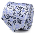 Close up view of a blue and white silk necktie featuring a floral pattern with hidden Mickey Mouse icons.