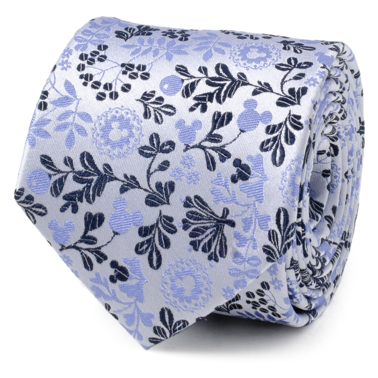Close up view of a blue and white silk necktie featuring a floral pattern with hidden Mickey Mouse icons.
