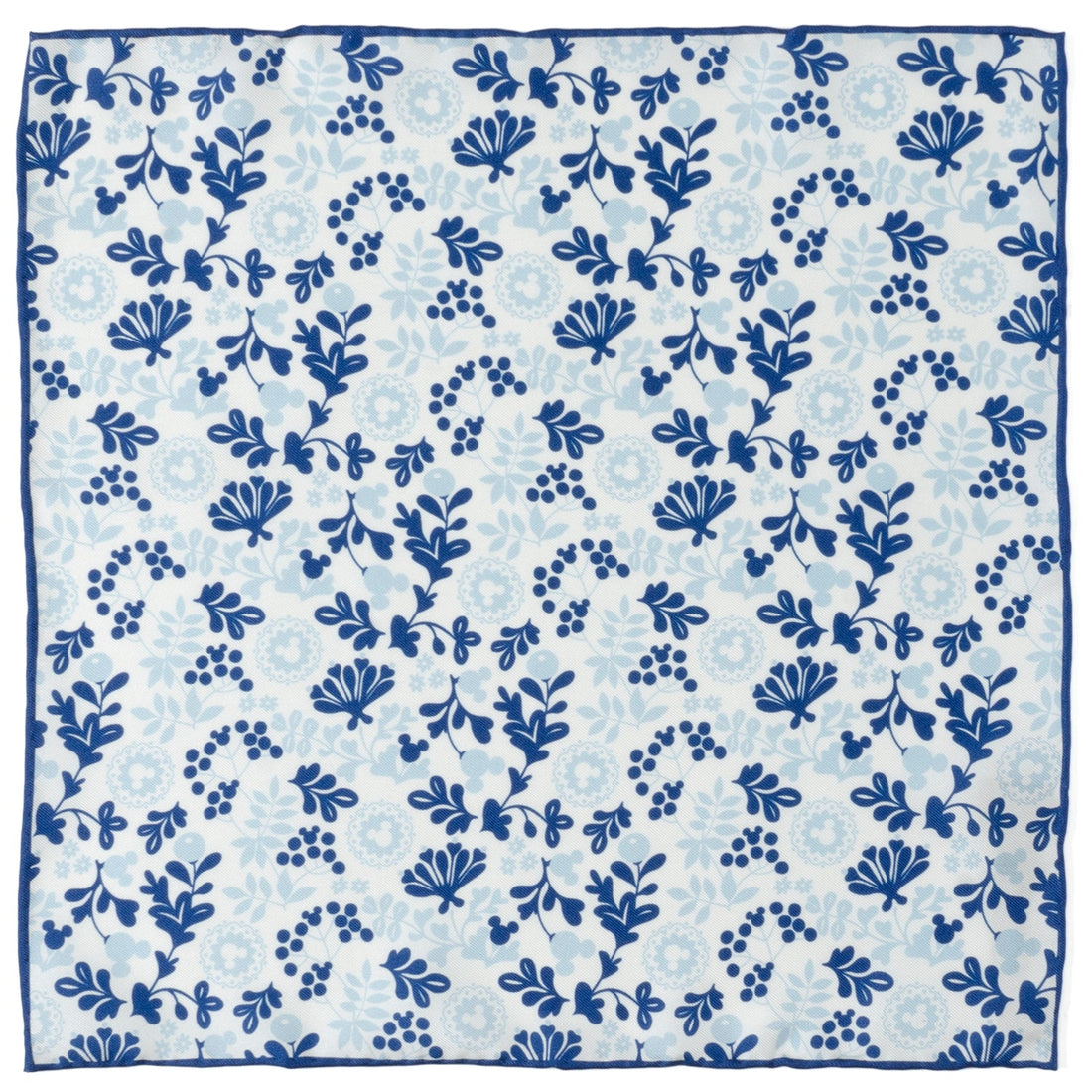 A white silk pocket square with a blue and navy floral pattern featuring hidden Mickey Mouse silhouettes.