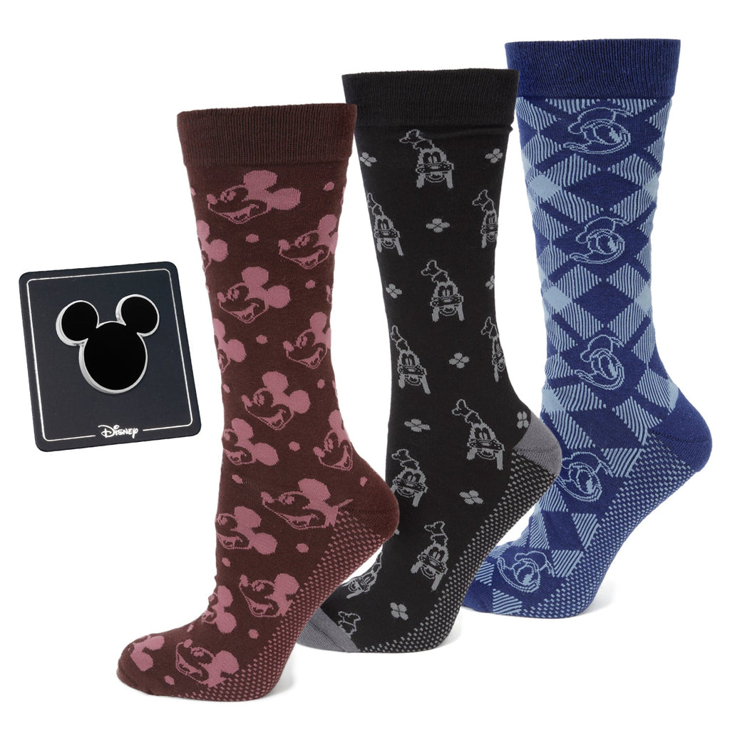 Mickey and Friends gift set including three pairs of patterned socks and a Mickey silhouette lapel pin