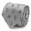 Close-up of a gray silk men's necktie featuring small black patterned motifs of Mickey Mouse, Donald Duck, and Pluto.