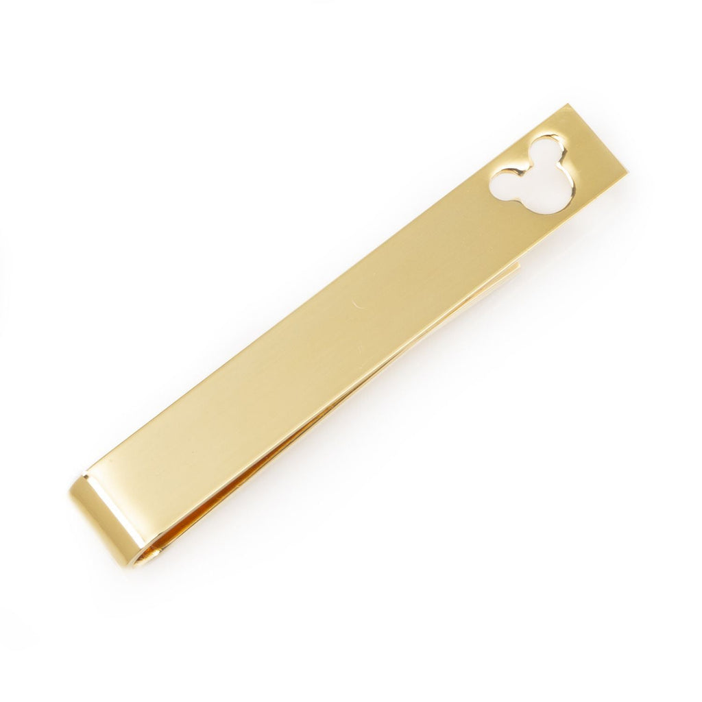 A gold-tone tie bar featuring a Mickey Mouse silhouette cutout at the end.
