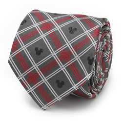 Close up of a gray, red, and white plaid silk necktie featuring small black Mickey Mouse icons, shown rolled and also on a suit mannequin.
