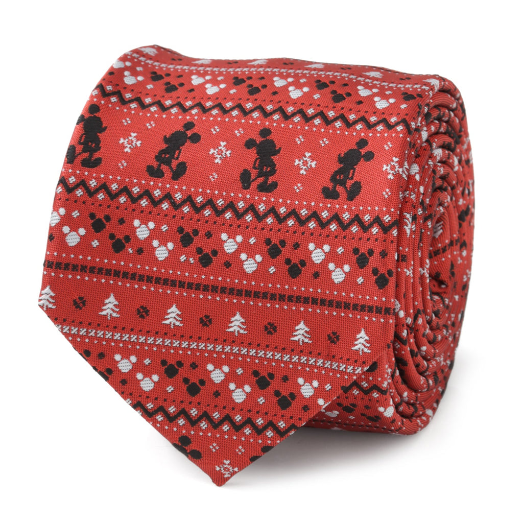 A red men's necktie with a festive Fair Isle pattern featuring Mickey Mouse silhouettes, snowflakes, and Christmas trees.