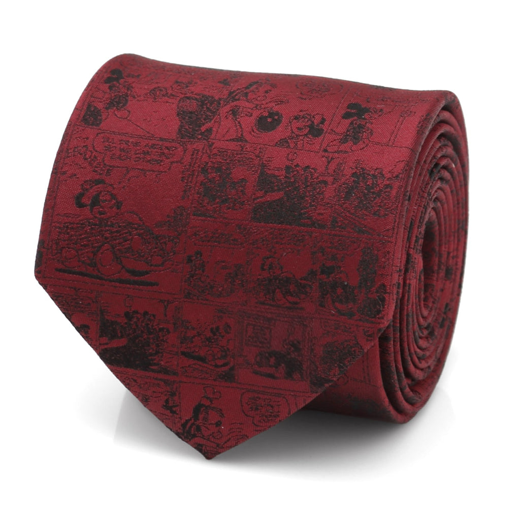 Close-up of a red men's necktie with a black printed comic strip pattern featuring Mickey Mouse and Goofy