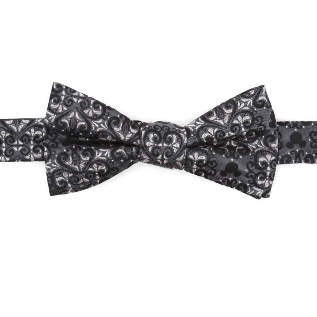 Close up of a gray and black silk bow tie featuring a damask pattern with hidden Mickey Mouse silhouettes.