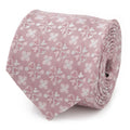 Close-up of a pink silk necktie featuring a subtle white and rose gold floral pattern with hidden Mickey Mouse icons.