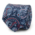Close up of a navy blue silk necktie with a paisley pattern incorporating hidden Mickey Mouse silhouettes and red accents