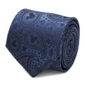 Close up of a navy blue silk necktie featuring a paisley pattern with hidden Mickey Mouse silhouettes.