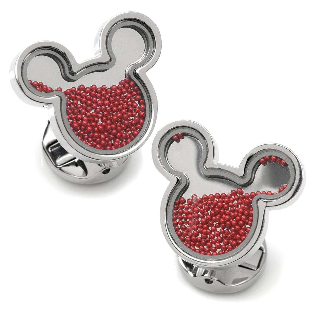 A pair of Mickey Mouse silhouette cufflinks featuring a clear center filled with loose red caviar beads and a stainless steel backing.