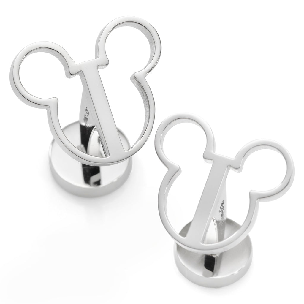 A pair of silver-toned stainless steel cufflinks shaped like the iconic Mickey Mouse head cutout.