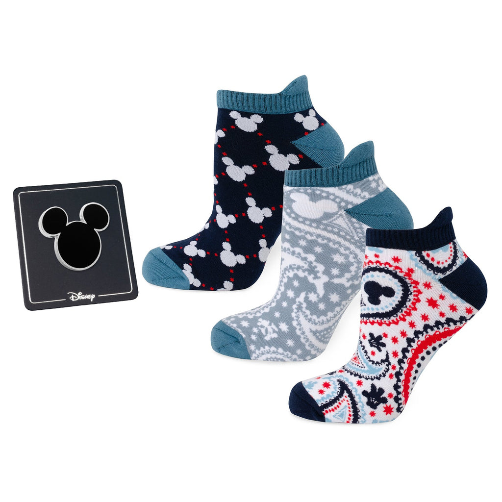 Disney Mickey Mouse gift set containing three pairs of ankle socks with paisley and mouse icon prints and a black Mickey silhouette lapel pin.