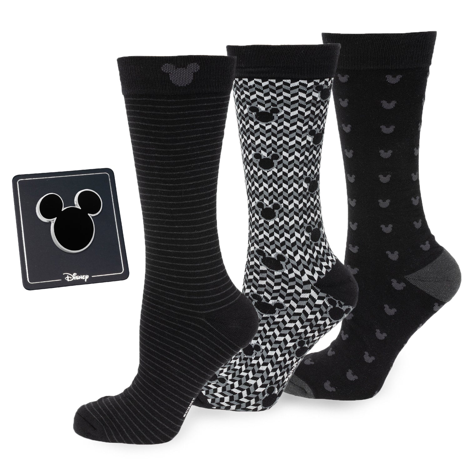 Mickey Mouse theme gift set featuring three pairs of black patterned crew socks and one black lapel pin in a display box.