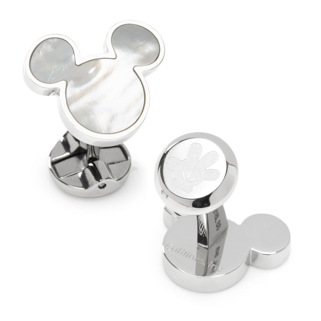 Close-up of Mickey Mouse shaped cufflinks with mother of pearl inlay and stainless steel backing