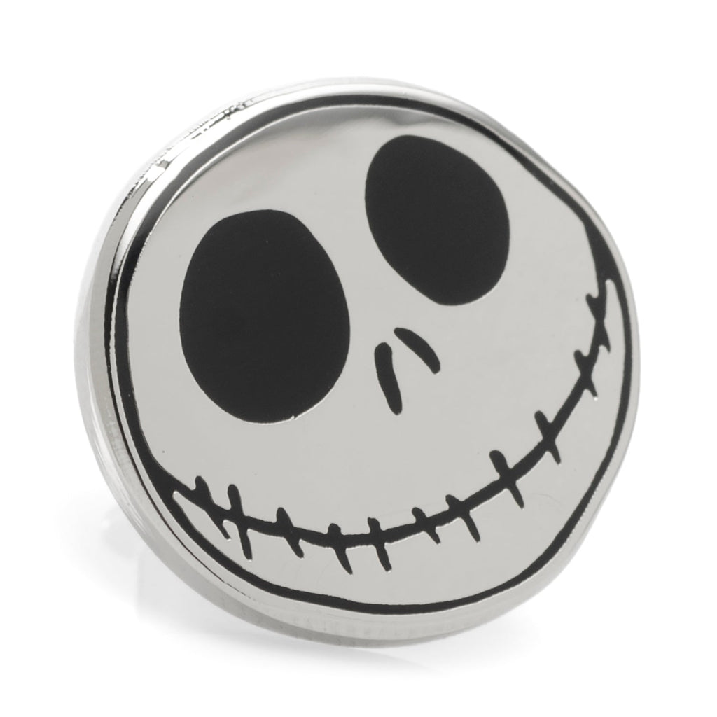 Close up of a circular Jack Skellington lapel pin featuring a black and silver face with a secure metal clutch backing.