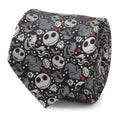 A close-up and mannequin view of a black and gray men's necktie featuring character patterns from The Nightmare Before Christmas.