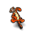 A colorful enamel lapel pin of Disney's Tigger in mid-bounce, featuring orange and black details, shown against a dark fabric background.