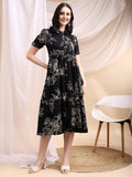A stylish Black Tiered A-Line Midi Shirt Dress with 3/4 sleeves and a round neck.