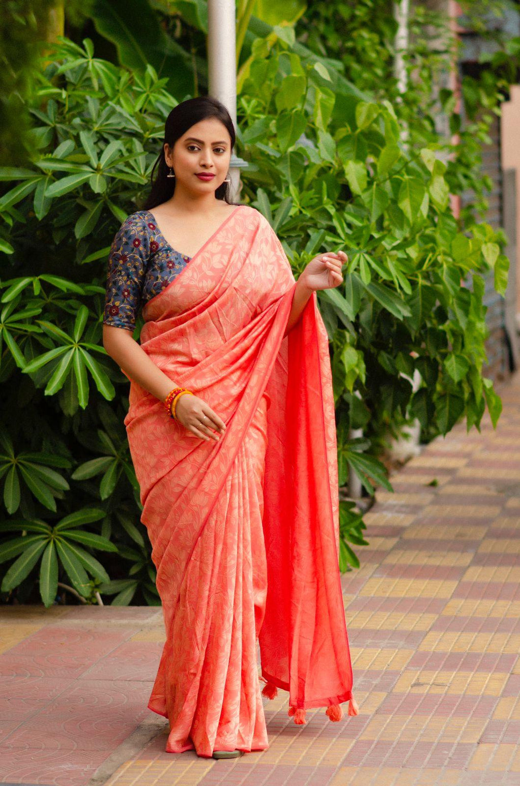 Pink jute silk saree with self-woven jacquard and kalamkari print blouse
