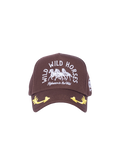 Brown cotton canvas cap with white Wild Horses embroidery on front and gold arrow accents on the brim