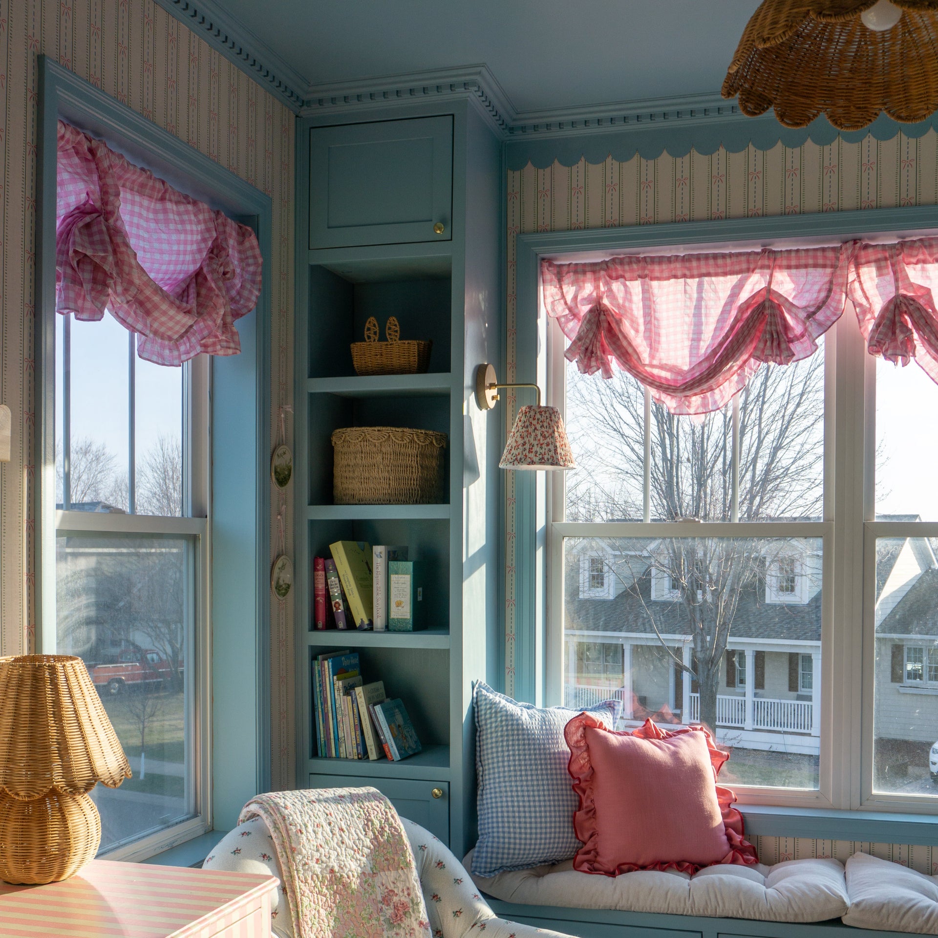 Close up of Lena striped wallpaper in powder blue, blush pink, and cream, featuring a traditional cottagecore aesthetic.