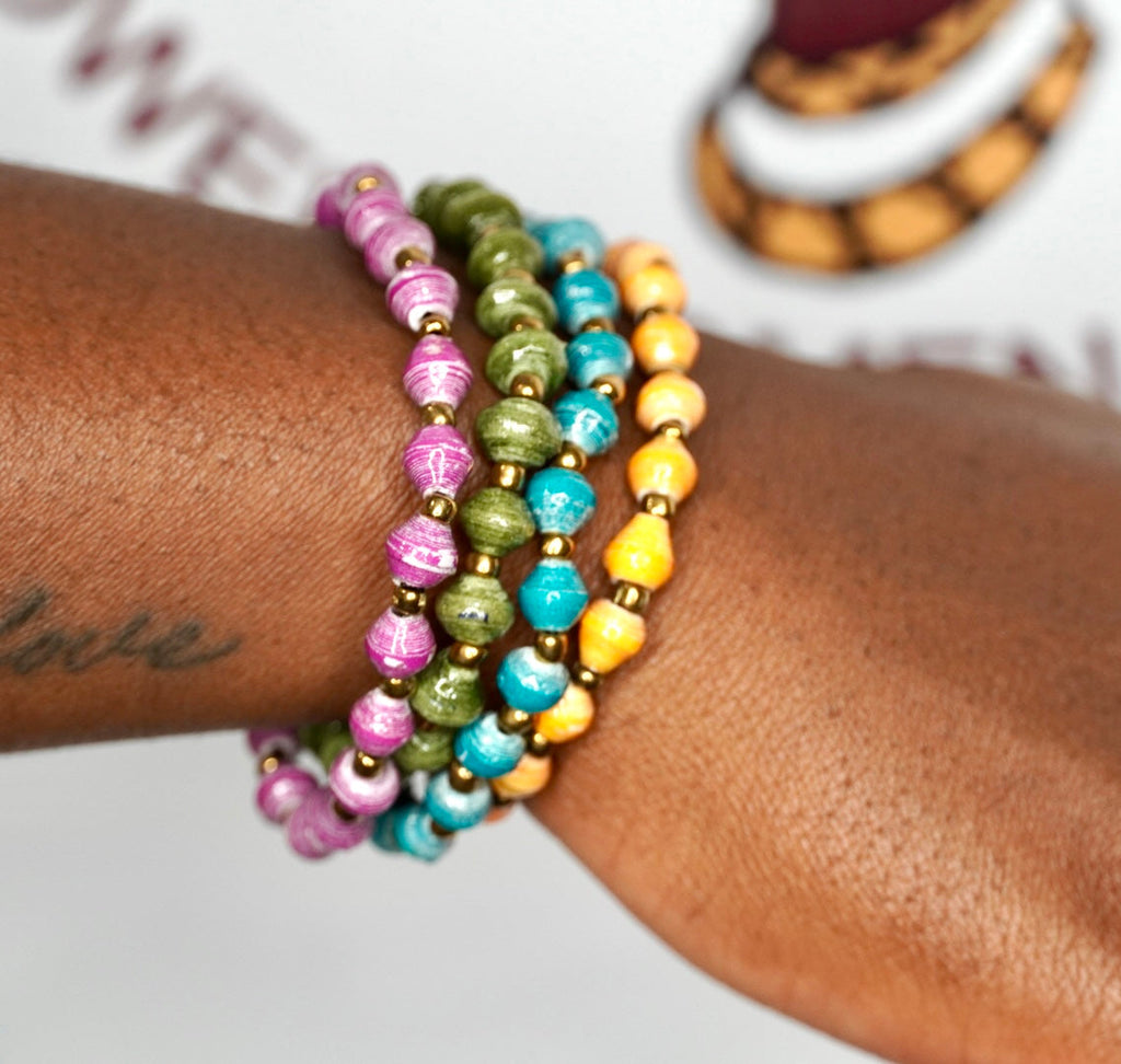 Set of 4 bohemian paper bead bracelets featuring purple, olive-green, turquoise, orange, and gold accents.