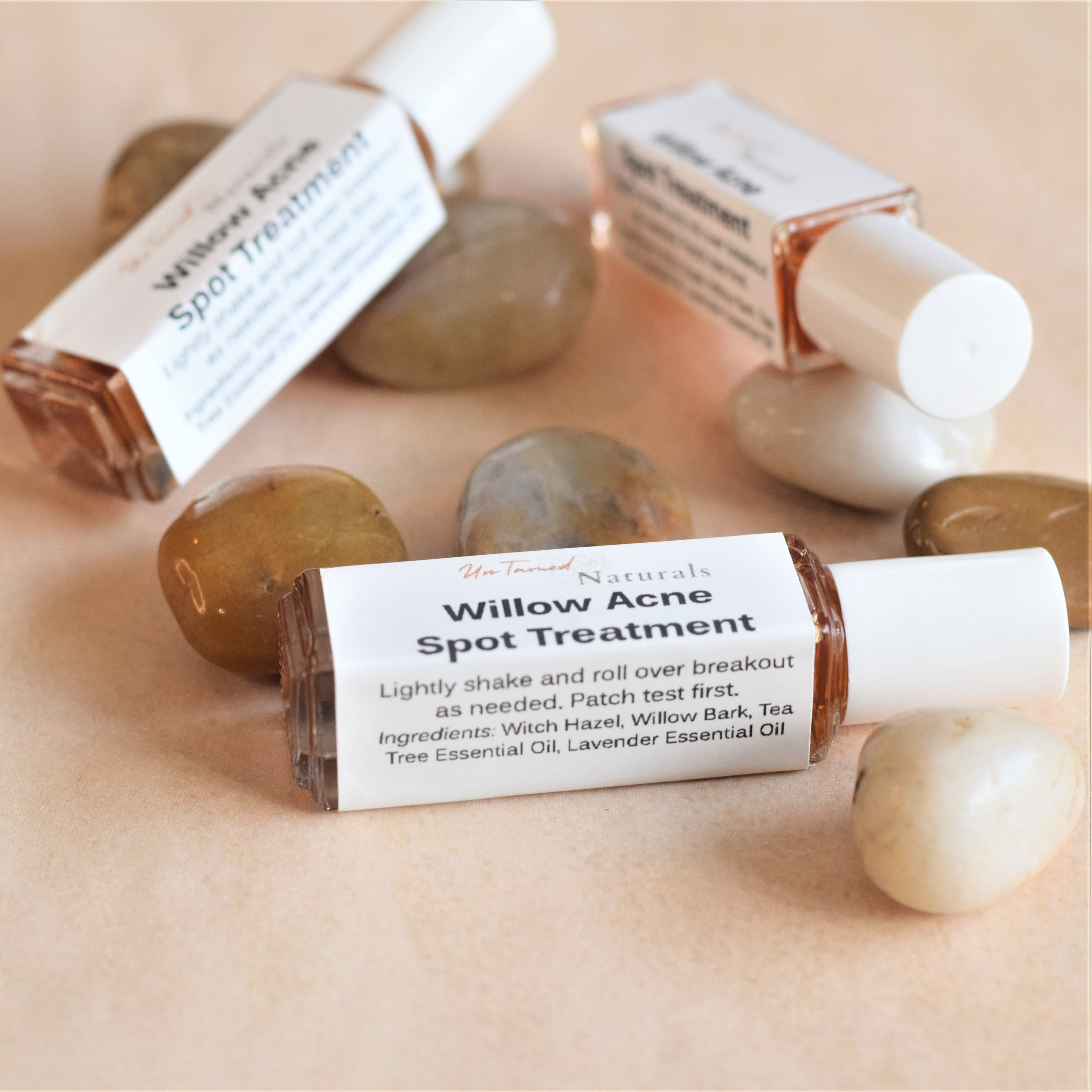 Willow Acne Spot Treatment roll-on bottle by UnTamed Naturals with key ingredients listed
