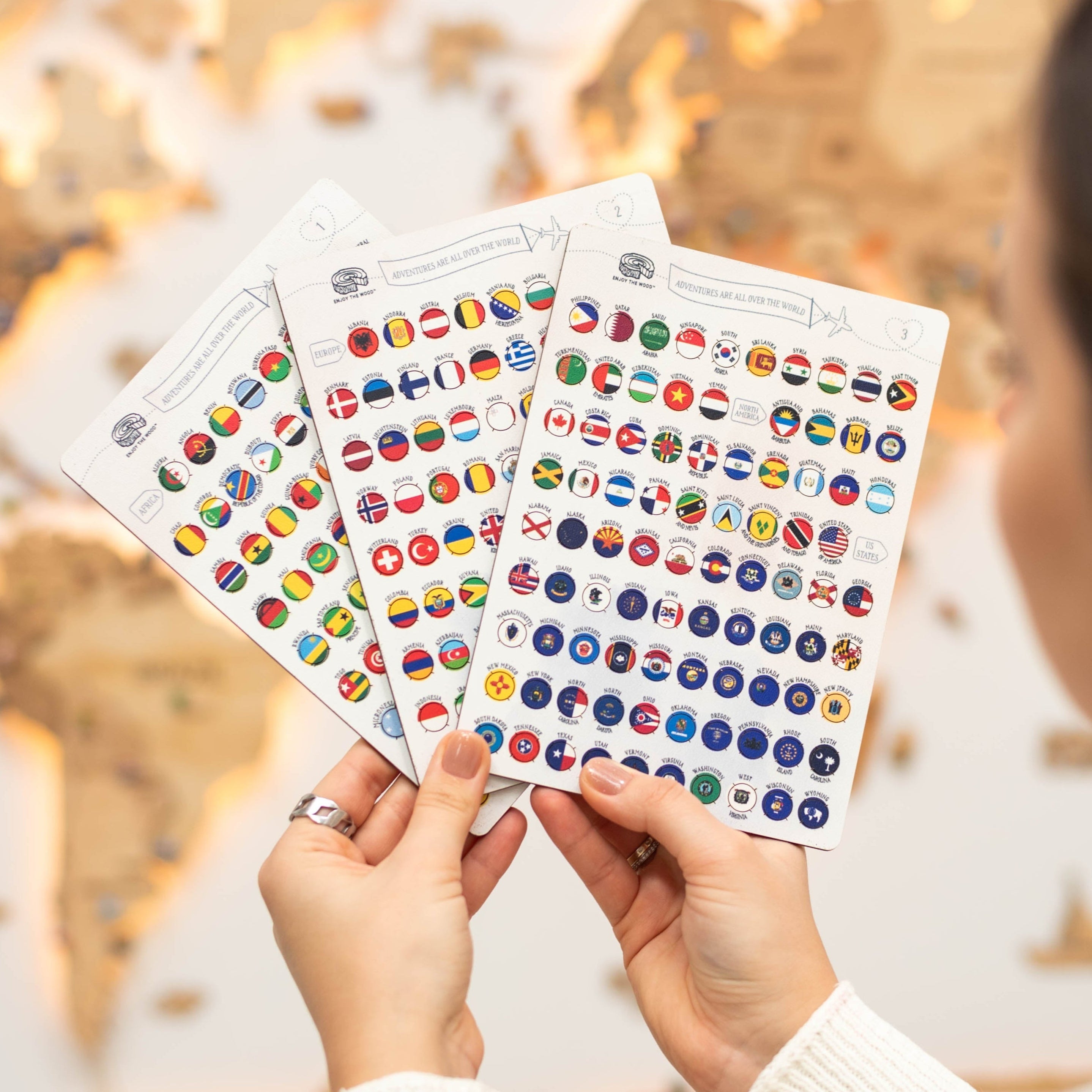 Close up of colorful wooden flag sticky pins designed for world map travel boards