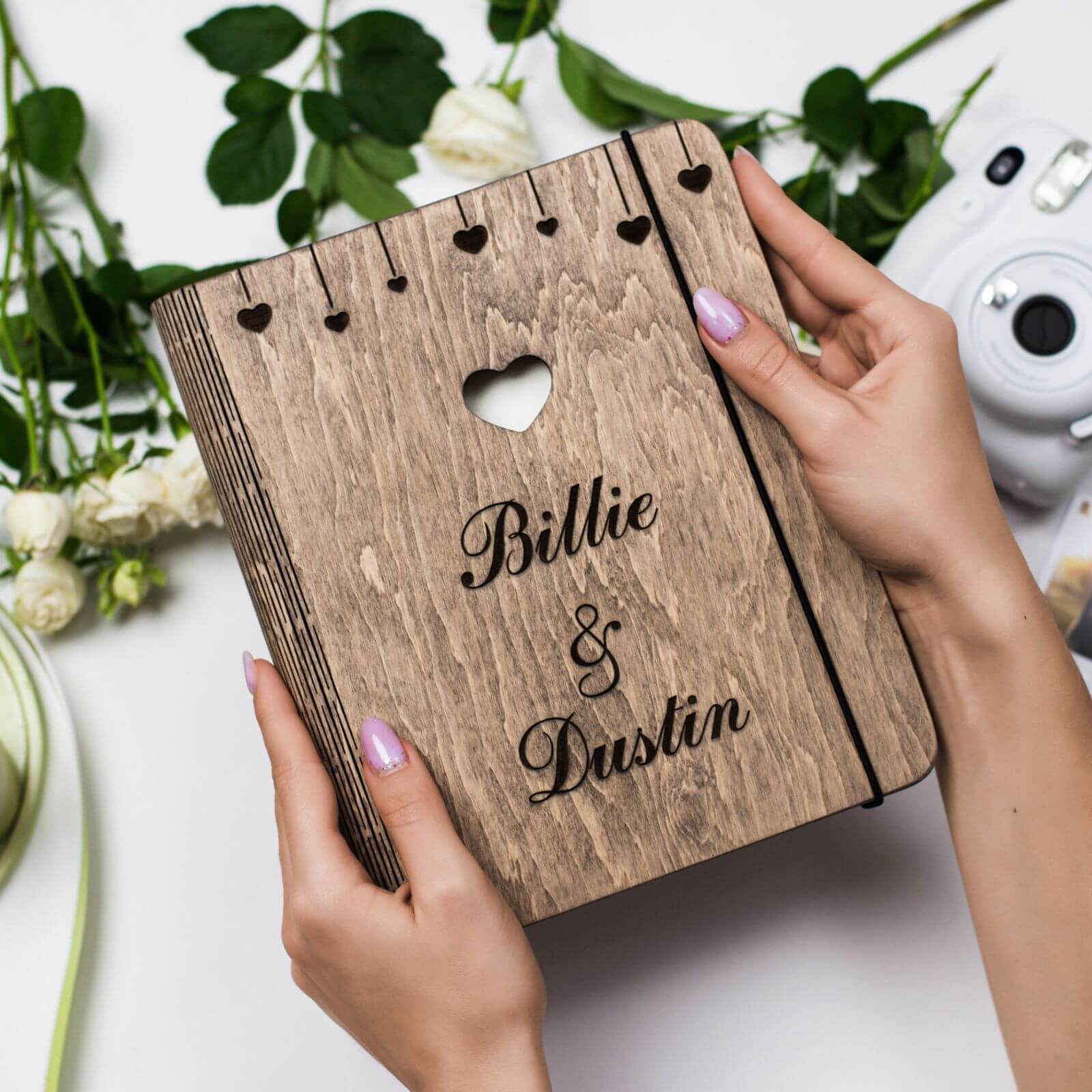 Rustic brown wooden wedding guest book and photo album with a natural finish
