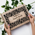 Personalized wooden wedding album with natural wood texture, perfect for rustic or bohemian home decor.