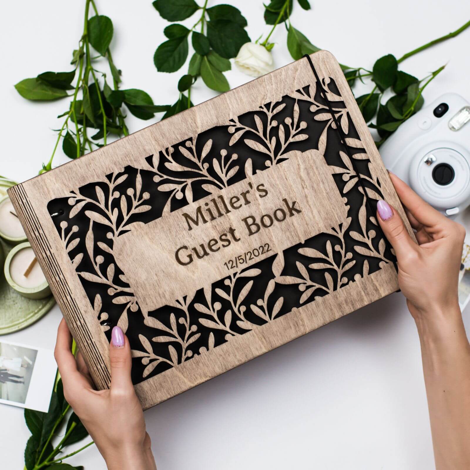 Personalized wooden wedding album with natural wood texture, perfect for rustic or bohemian home decor.