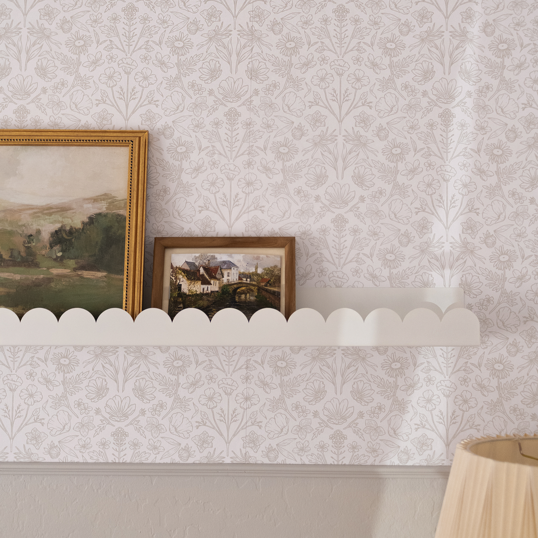 Junie floral pattern wallpaper in white and pale pink hues