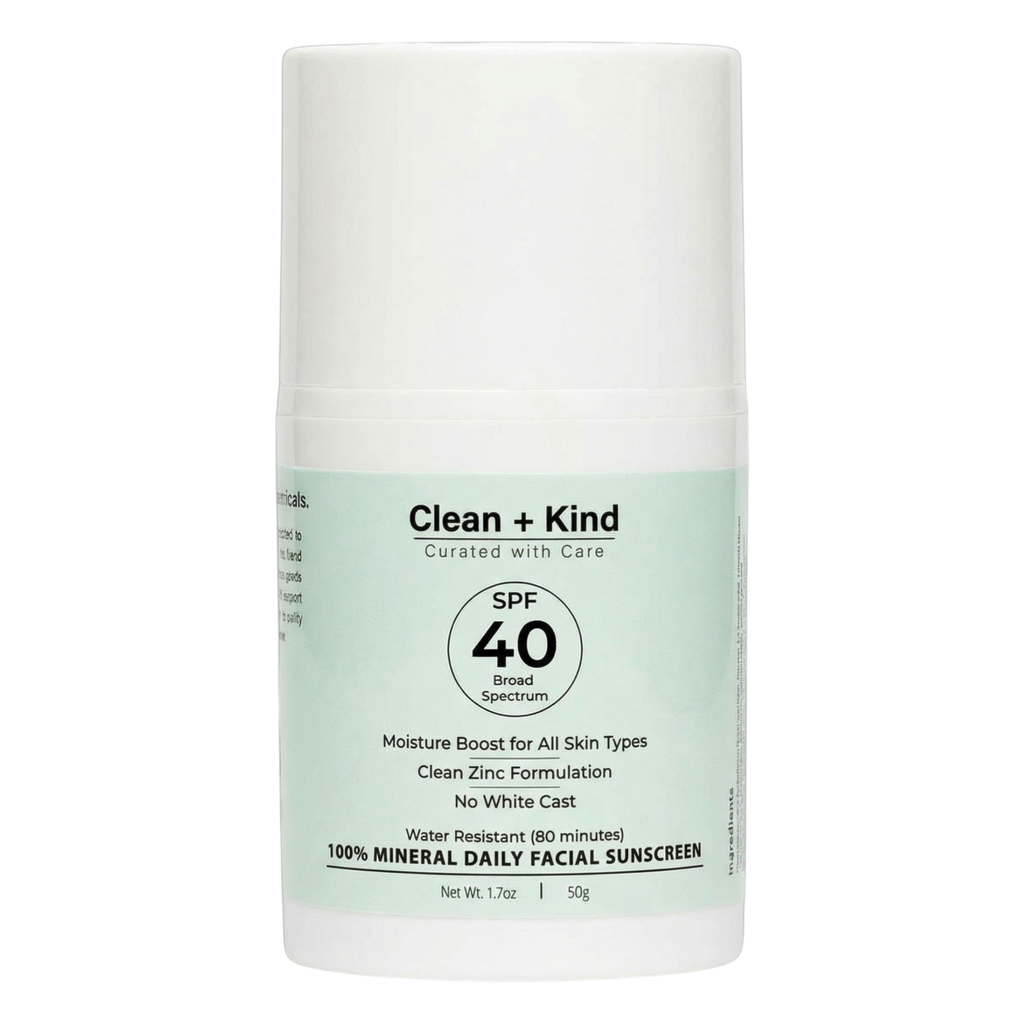 Bottle of Clean + Kind daily mineral facial sunscreen SPF 40, white bottle with light green label.