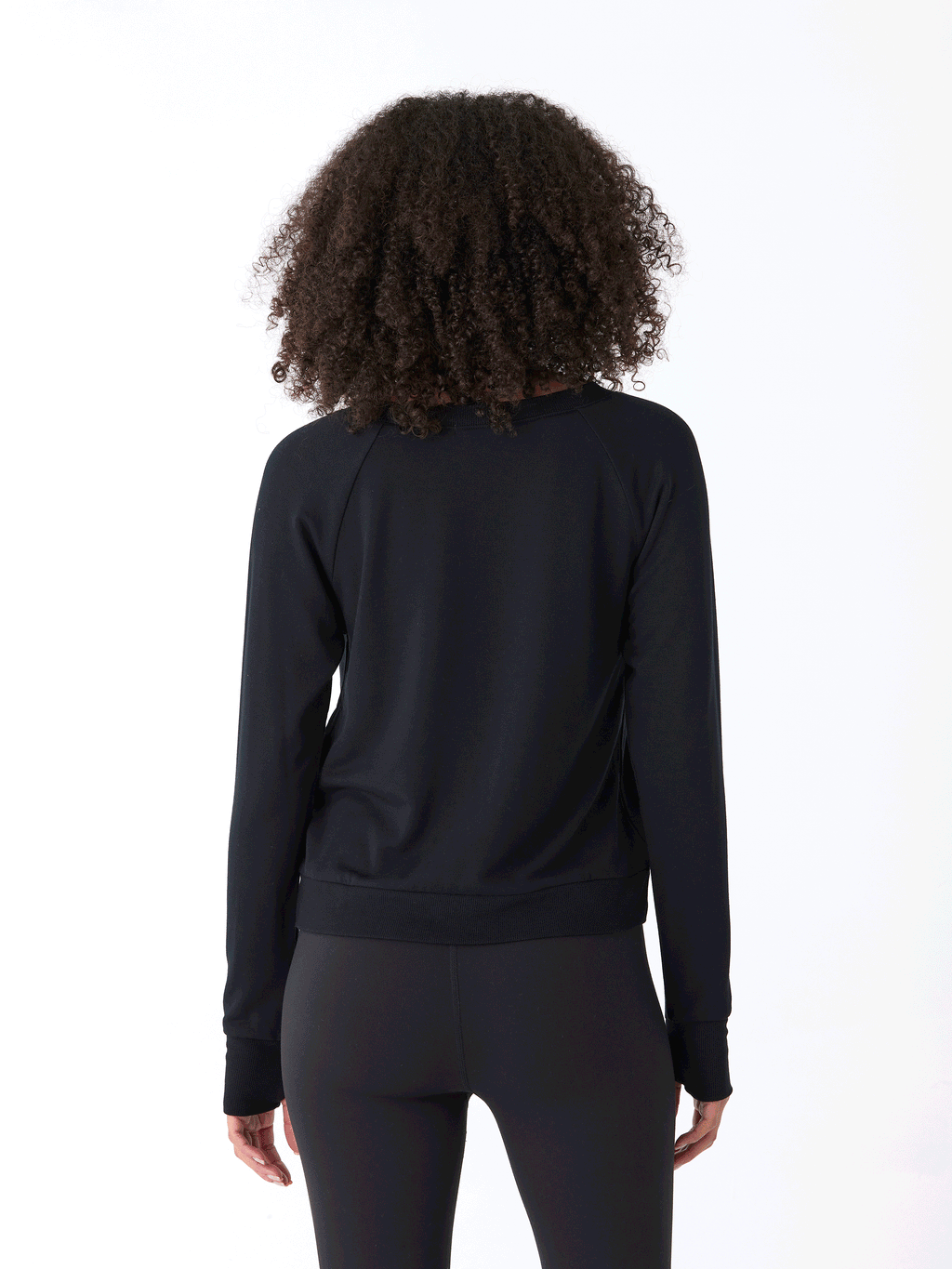Halle Feather Fleece Crossover Hem Top in Black